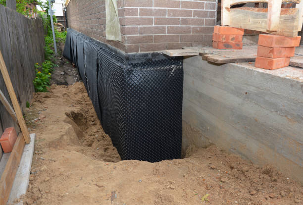 Happy homeowners after waterproofing job in Plainwell